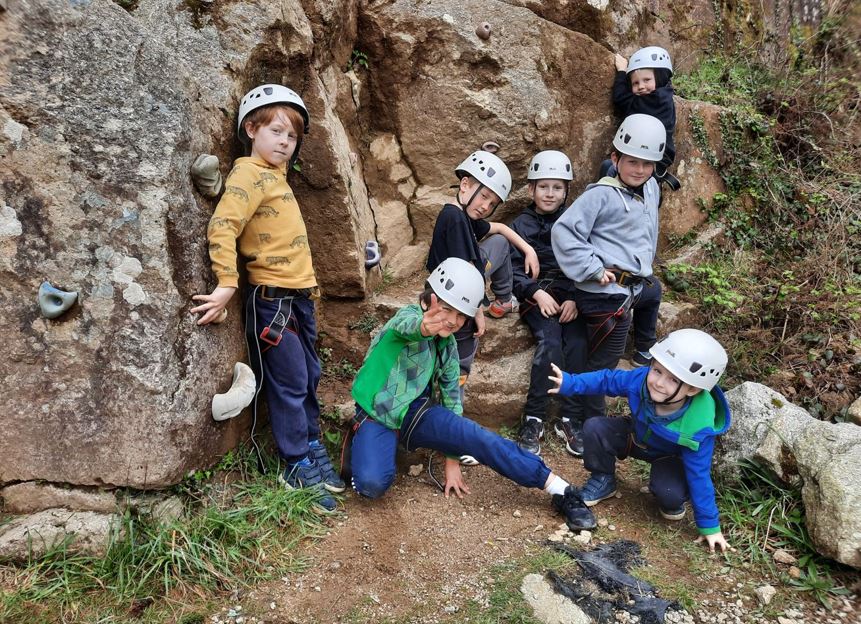 A group of children climbing